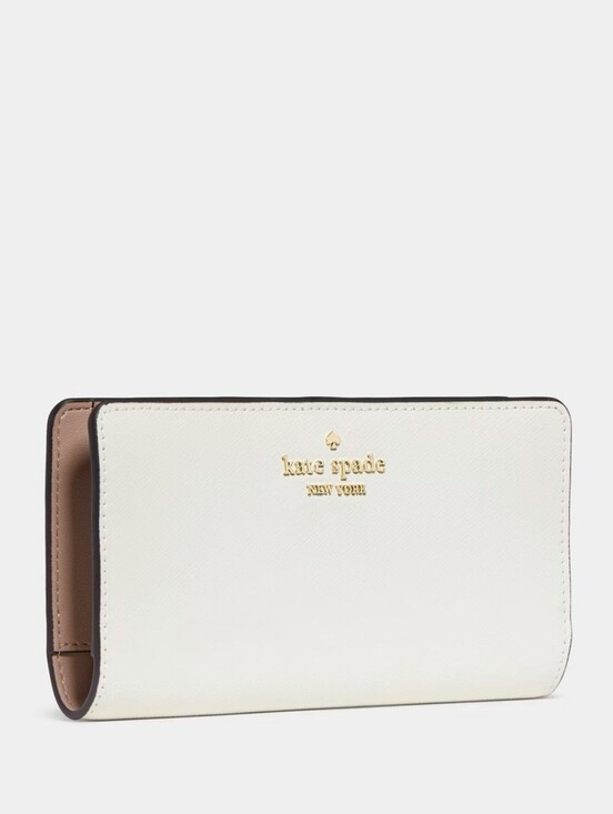 kate spade Handbags - Pre Owned Kate Spade Large Slim Bifold Wallet Meringue